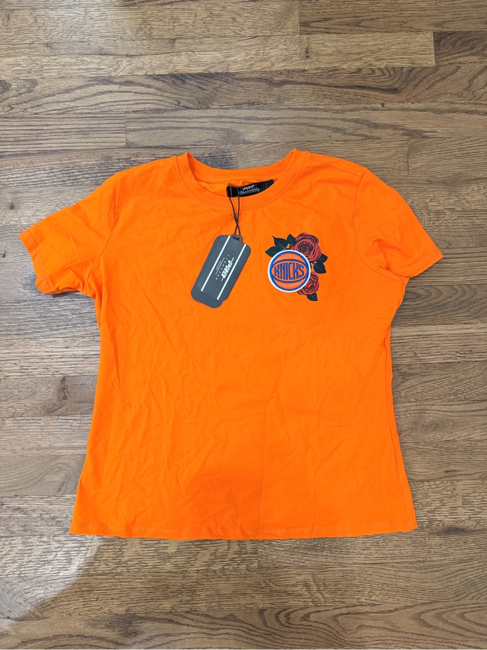 Woman’s Pro Standard Orange New York Knicks Rose T shirt